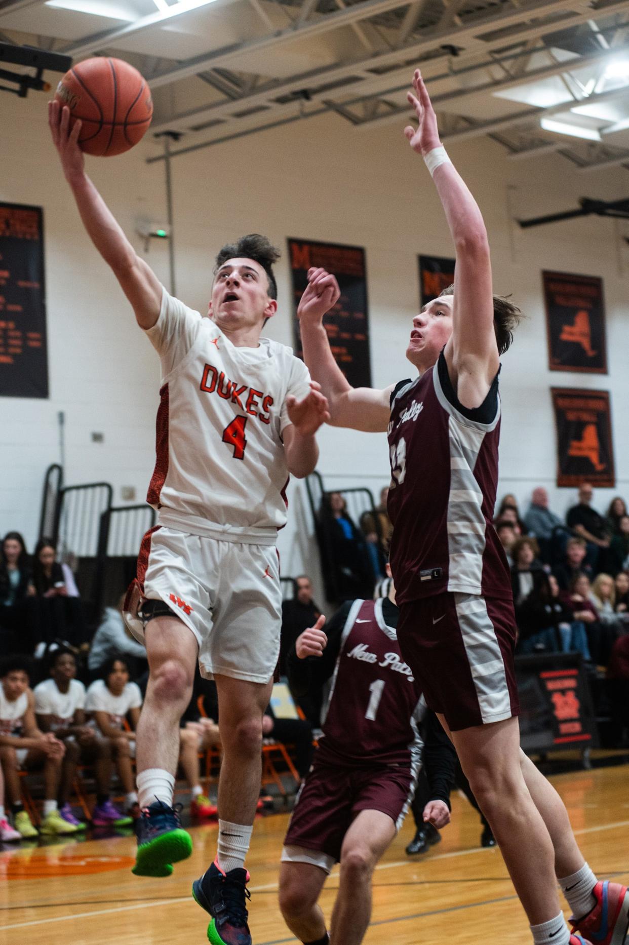 Marlboro's Christopher DeNatale goes up for a layup against New Paltz during a Feb. 2, 2024 boys basketball game.