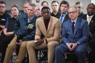 <p>Waffle House patron James Shaw, Jr. (C) who stopped the shooting at a Waffle House where a gunman opened fire killing four and injuring two attends a press conference with FBI Special Agent In Charge, Matthew Espenshade (L) and Metro Nashville Mayor David Briley (right) on April 22, 2018 in Nashville, Tennessee. Shaw, Jr., 29, took action disarming the gunman and ultimately forcing him out of the Waffle House restaurant. Travis Reinking, 29, of Morton, IL, is person of interest in the shooting and is suspected to have left the scene naked. (Photo: Jason Davis/Getty Images) </p>