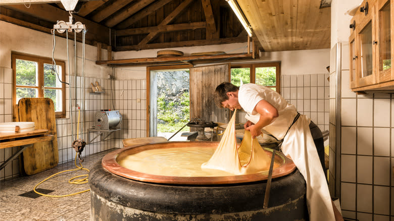 person making raw milk cheese