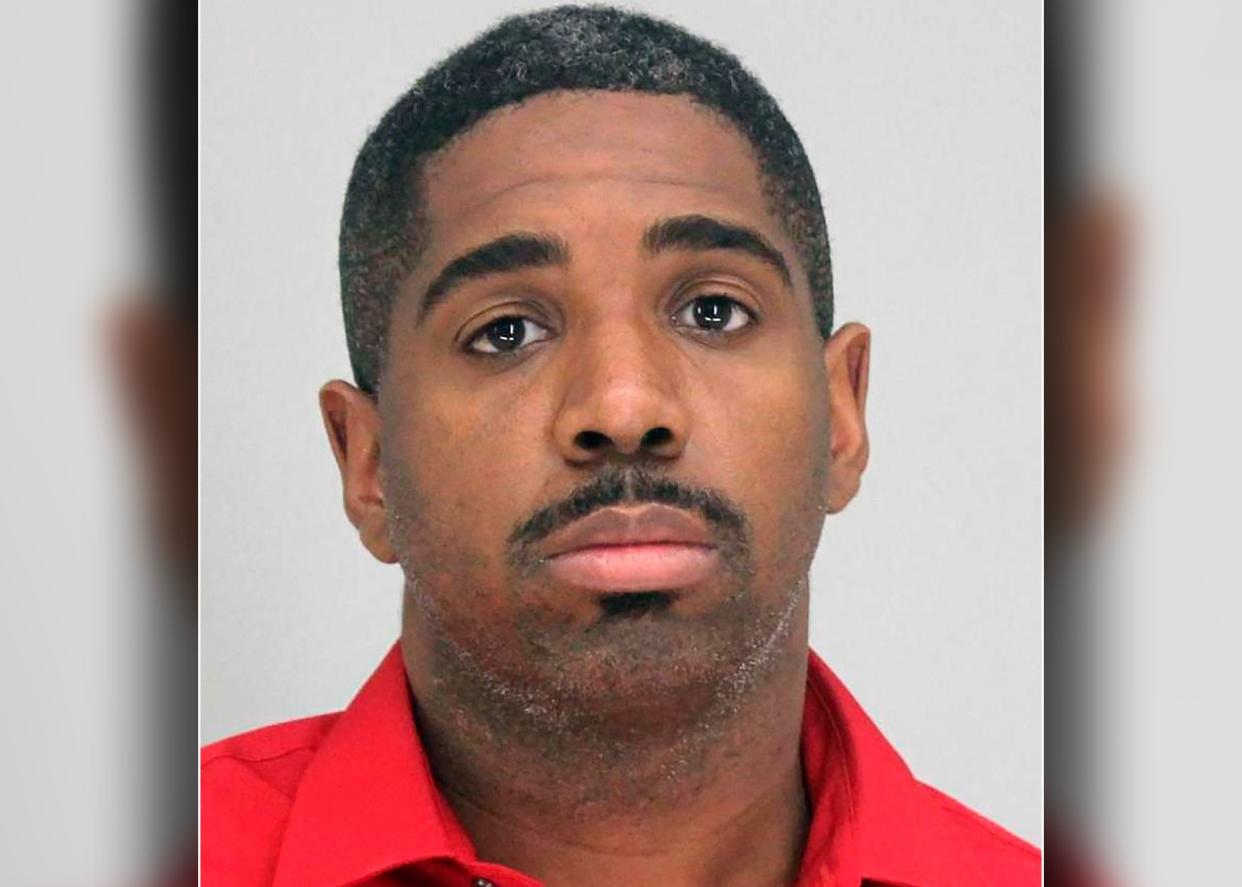 This photo provided by the Dallas County Sheriff's Office shows Bryan Riser. Authorities say Riser, a Dallas police officer, has been arrested on two counts of capital murder, more than a year and a half after a man told investigators that he kidnapped and killed two people at the officer’s instruction in 2017.