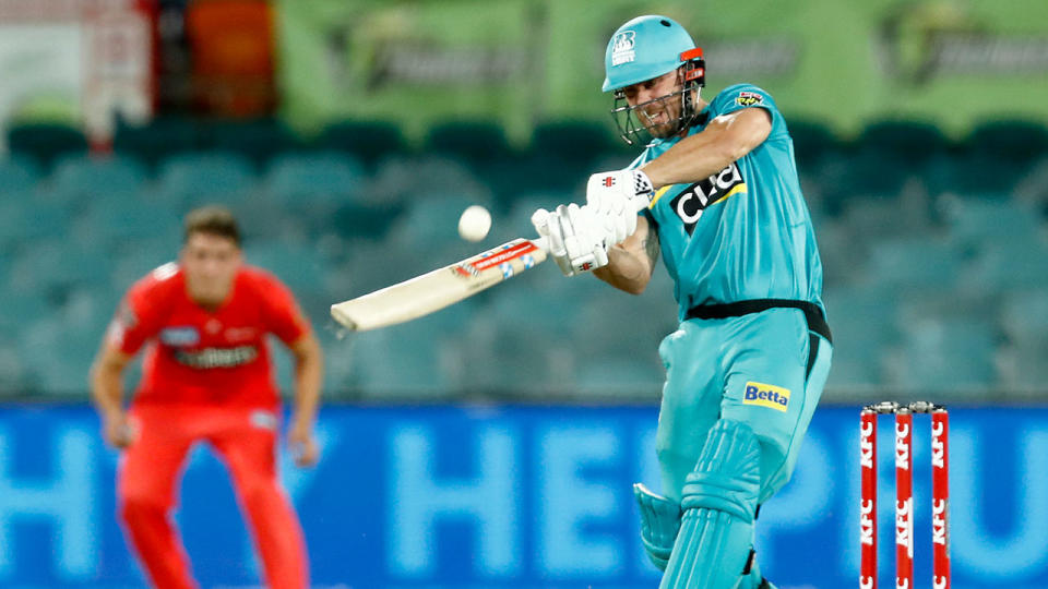 Pictured here, Chris Lynn blasts a ball from the Renegades towards the boundary.