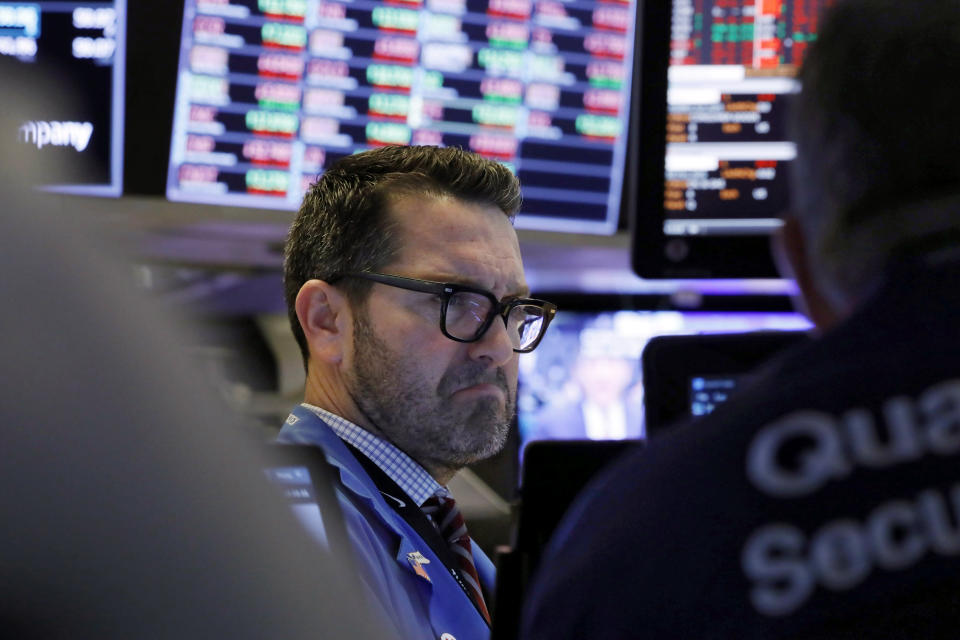 Trader Leon Montana works on the floor of the New York Stock Exchange, Friday, Feb. 28, 2020. Stocks are opening sharply lower on Wall Street, putting the market on track for its worst week since October 2008 during the global financial crisis. (AP Photo/Richard Drew)