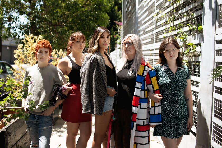 LOS ANGELES, CA - JULY 17: Rain Valdez the founder of ActNow, along with a group of her producers and stage managers, (from left) Charlie Jacobs, Jasmine Linforth, (from right) Brynn Allen and Jen Winslow pose for a portrait before they lead a group of LGBTQ+ thespians in an acting class in Los Angeles on Sunday, July 17, 2022 in Los Angeles, CA. (Jason Armond / Los Angeles Times)