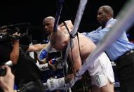 <p>Floyd Mayweather Jr. in action with Conor McGregor as referee Robert Byrd looks on REUTERS/Steve Marcus </p>