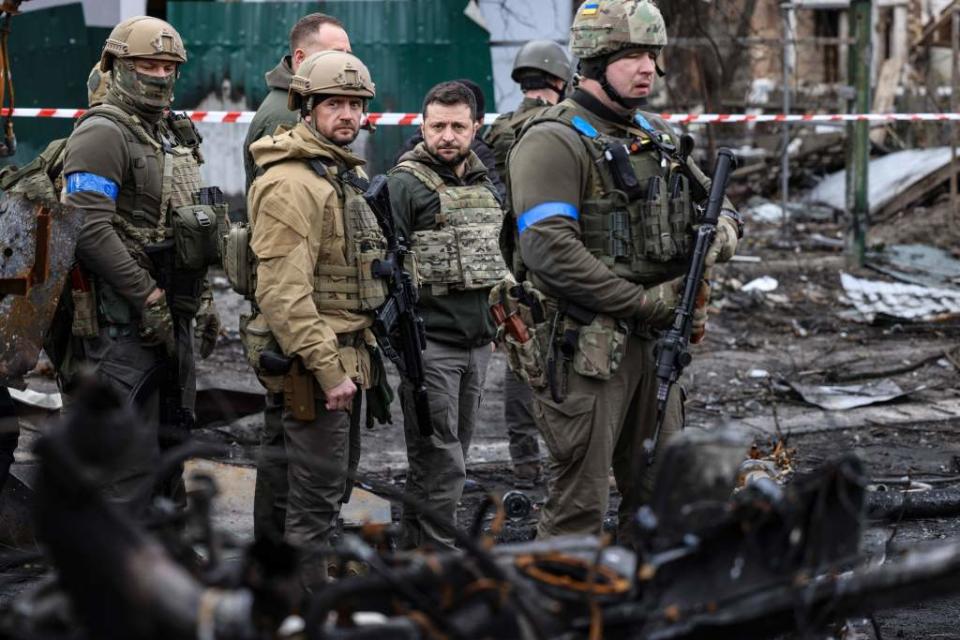 Zelensky inspecting the carnage in Kiev in April 2022 during the early days of the Russian invasion. AFP via Getty Images