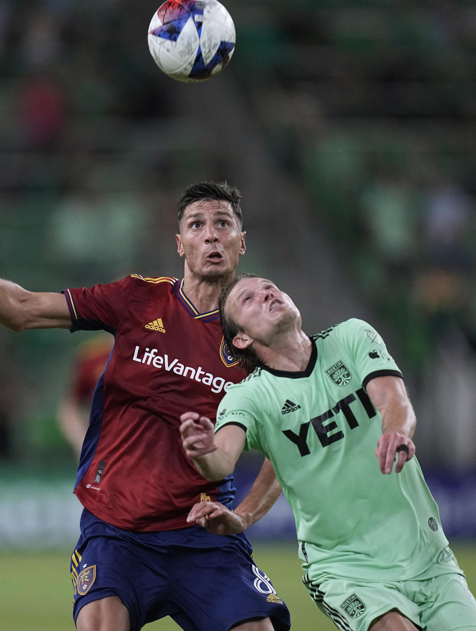 Austin FC midfielder Alexander Ring, right, and Real Salt Lake midfielder Damir Kreilach, left, eye a pass during the second half of an MLS soccer match in Austin, Texas, Saturday, June 3, 2023. (AP Photo/Eric Gay)