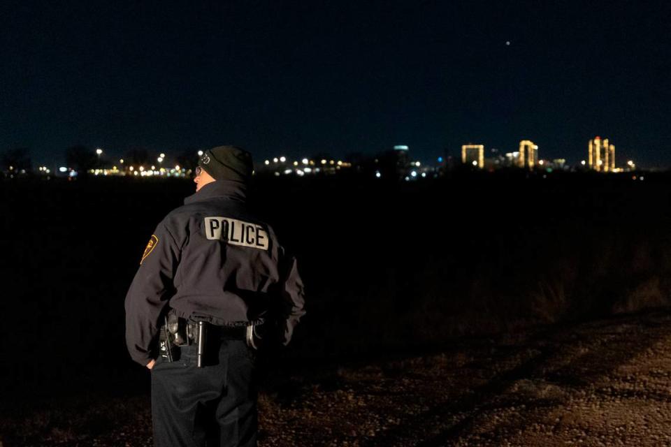 FWPD officer Ron Andriotto parks along a dirt path as Tarrant County Homeless Coalition volunteers search the area for unsheltered individuals during the Point in Time Count on Thursday, Jan. 27, 2023, in Fort Worth. TCHC deployed hundreds of volunteers throughout the city to connect with unsheltered residents and provide resources for housing.