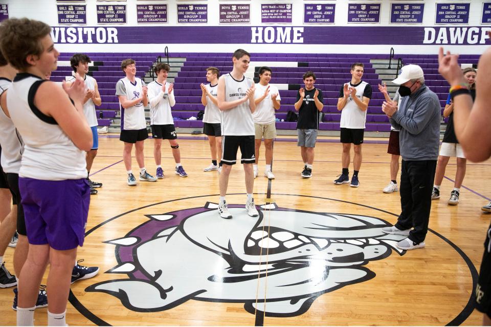 Rumson-Fair Haven High School boys basketball manager Matt "Matty Cools" Newman, who has autism, leads the team through some fun games and exercises during the first half of practice.       
Rumson, NJ
Friday, February 11, 2022