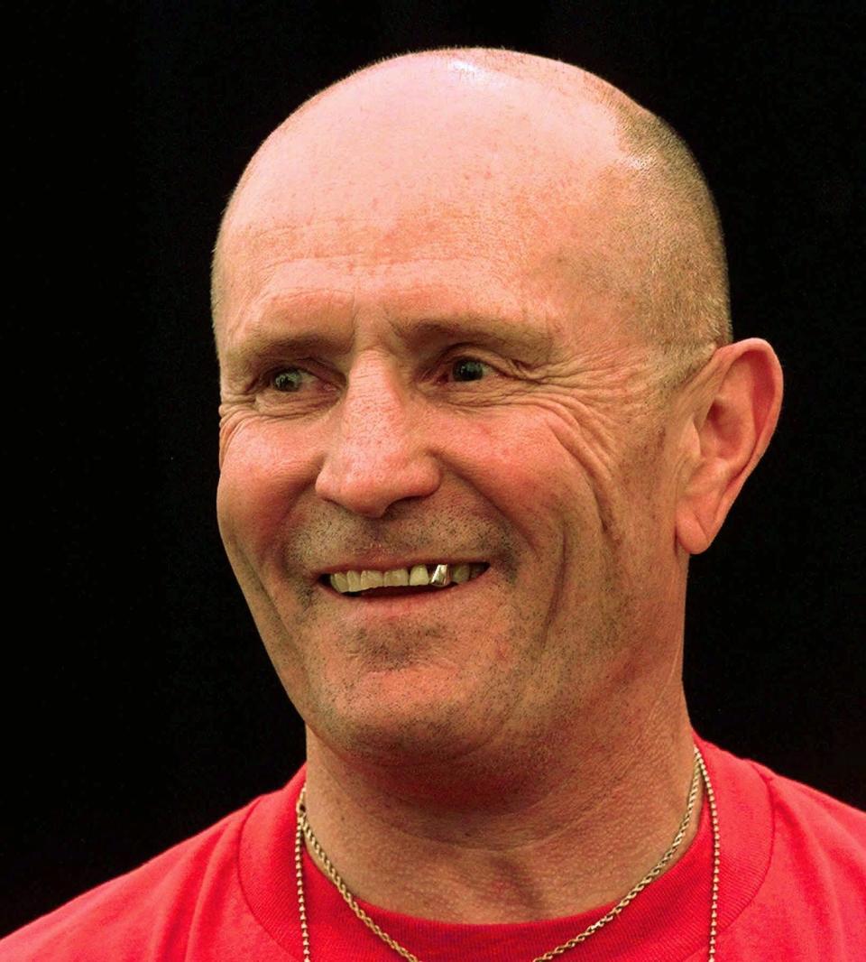 Mills Lane smiles during undercard weigh ins for the Holyfield Tyson rematch at the MGM Grand in Las Vegas, Friday, June 27, 1997. Lane died Tuesday in Reno.