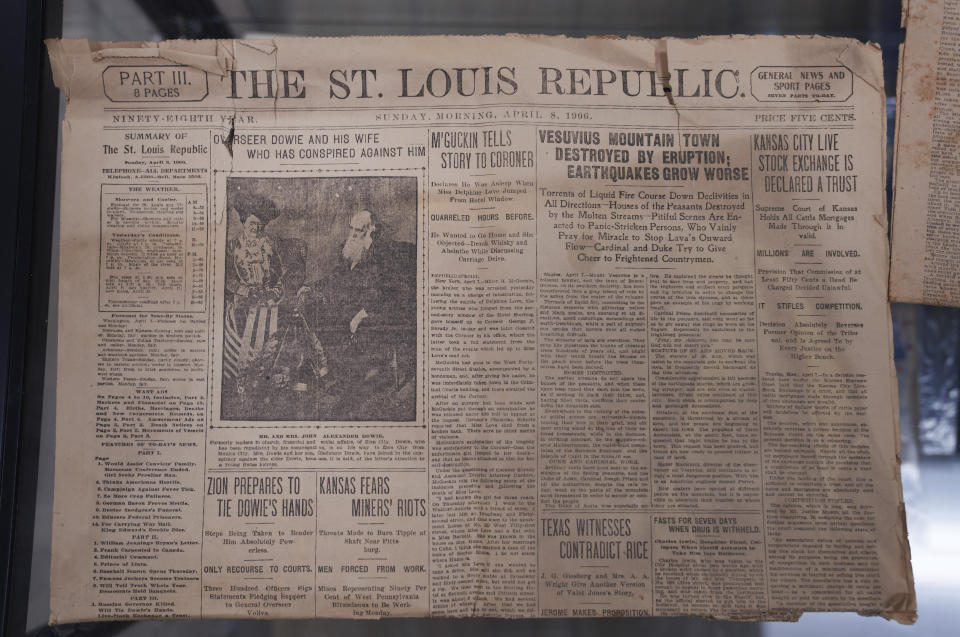 An article written about the downfall of Christian faith healer, John Alexander Dowie, in a 1906 edition of the St. Louis Republic will sit in the archival display of the new Fath-e-Azeem mosque, in Zion, Ill., Thursday, Sept. 15, 2022. This will be the city's first official mosque, which was born from a century-old prayer duel between the town's founder, Dowie, and the Ahmadiyya Muslim community's founder, Mirza Ghulam Ahmad. (AP Photo/Jessie Wardarski)