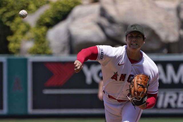 Los Angeles Angels starting pitcher Shohei Ohtani throws to the plate during the first inning of a baseball game against the Minnesota Twins Sunday, May 21, 2023, in Anaheim, Calif. (AP Photo/Mark J. Terrill)