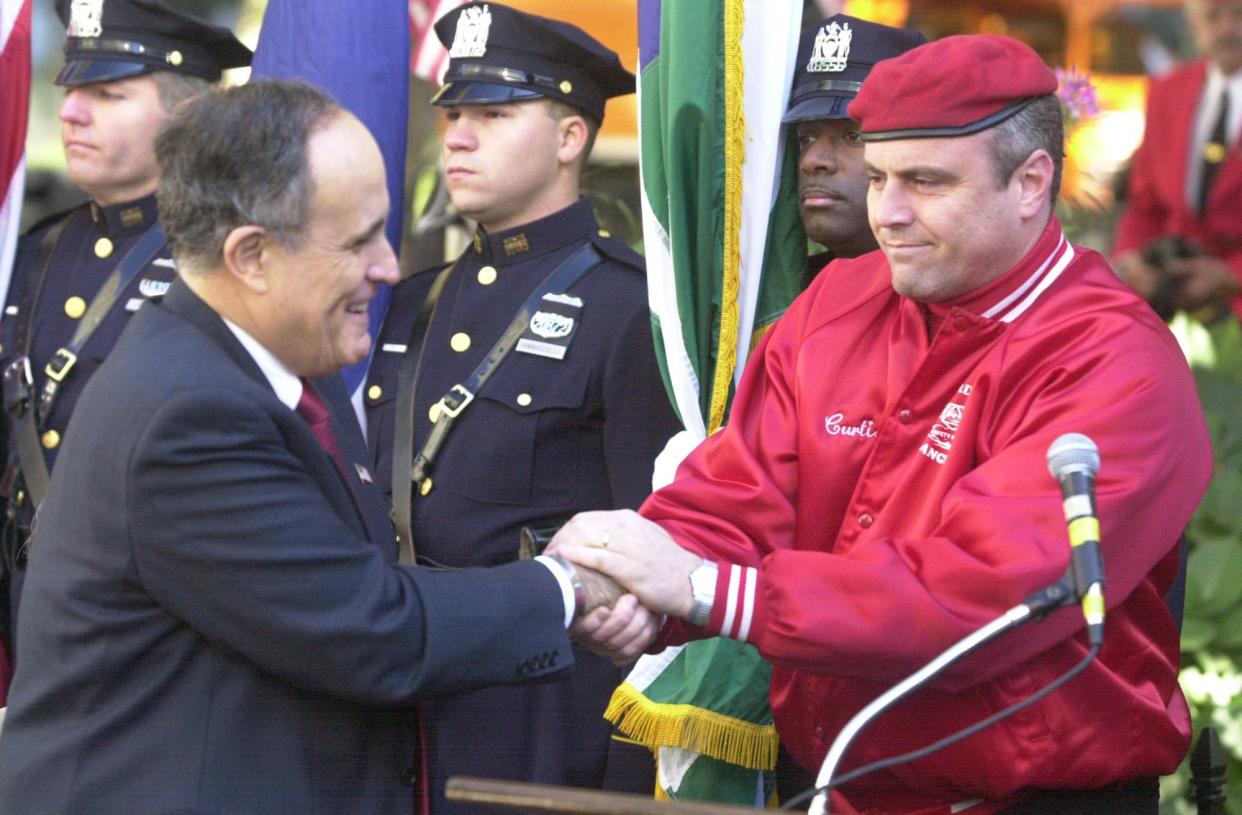 (left) Rudolph Giuliani and New York City Republican mayoral candidate Curtis Sliwa (right) 