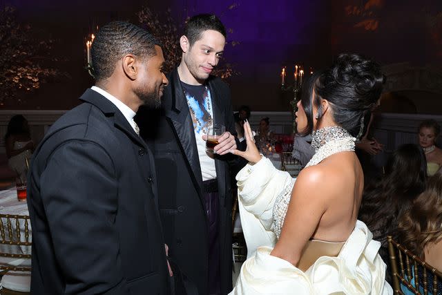 Kevin Mazur/MG23/Getty Images for The Met Museum/Vogue Usher, Pete Davidson and Kim Kardashian