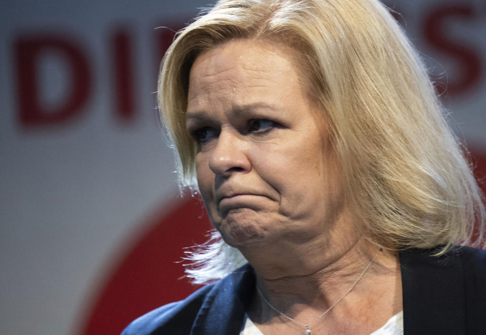 Nancy Faeser, top candidate of the SPD and Federal Minister of the Interior, gestures at the election party of the SPD, in Wiesbaden, Germany, Sunday, Oct. 8, 2023. Germany's center-right opposition was set to win two state elections on Sunday at the halfway mark of Chancellor Olaf Scholz's unpopular national government, according to exit polls, which showed gains for a far-right party. Germany's national interior minister, who had faced an uphill struggle in a bid to become governor of her home region, appeared headed for a heavy defeat. (Boris Roessler/dpa via AP)