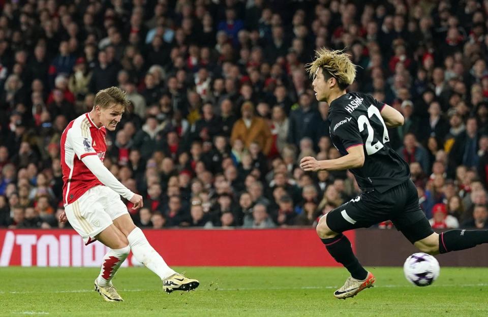 Odegaard’s finish gave Arsenal an unassailable lead (PA)