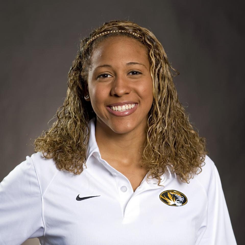 In this 2010 photo provided by the University of Missouri Athletic Department is Sasha Menu Courey. The Canadian family of former University of Missouri school swimmer says the school and its athletics department failed to properly investigate her alleged off-campus rape by as many as three football players in 2010. Menu Courey struggled with mental illness and committed suicide 16 months later. (AP Photo/University of Missouri Athletic Department)