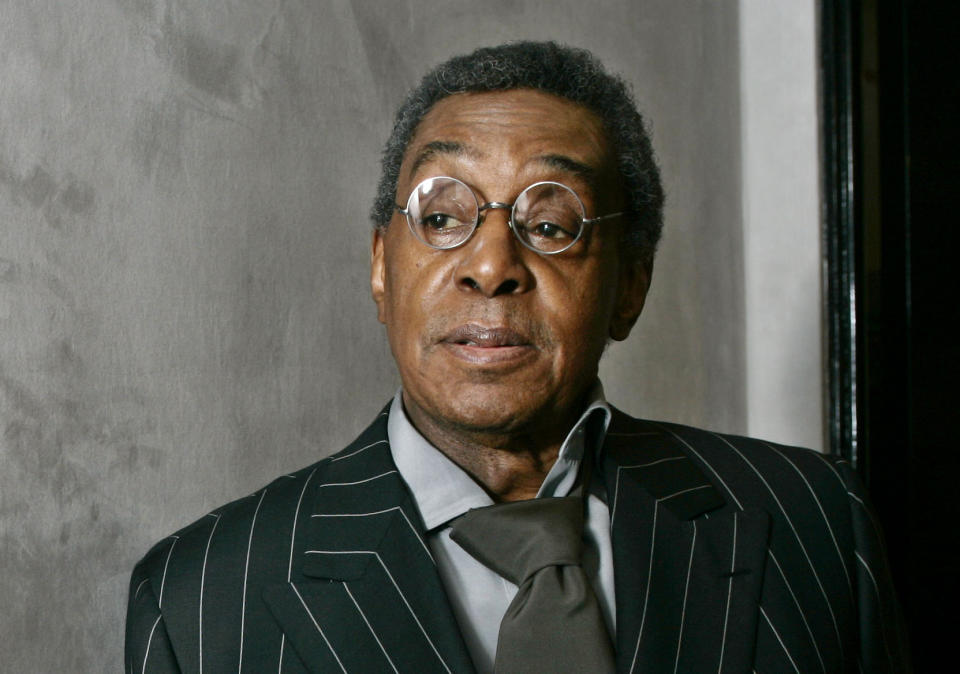 FILE - Don Cornelius poses at his Los Angeles office on March 6, 2006. The late “Soul Train” creator will be inducted into the Rock & Roll Hall of Fame on Friday night. (AP Photo/Damian Dovarganes, File)