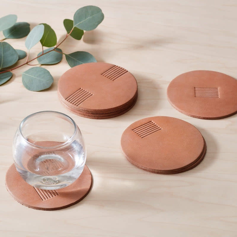 <p><a href="https://go.redirectingat.com?id=74968X1596630&url=https%3A%2F%2Fwww.the-citizenry.com%2Fproducts%2Fazad-leather-coasters%3Fv%3D31069047717961%26gad_source%3D1%26gclid%3DCj0KCQjwy4KqBhD0ARIsAEbCt6iRuPyAV0I2bKO-yQO-ymomY5DOPLEtbTw5vR3YphCrzwAQn9i1u2kaAlPtEALw_wcB&sref=https%3A%2F%2Fwww.esquire.com%2Ffood-drink%2Fdrinks%2Fg37221781%2Fgifts-for-bartenders%2F" rel="nofollow noopener" target="_blank" data-ylk="slk:Shop Now;elm:context_link;itc:0;sec:content-canvas" class="link ">Shop Now</a></p><p>Azad Leather Coasters</p><p>the-citizenry.com</p><p>$69.00</p>