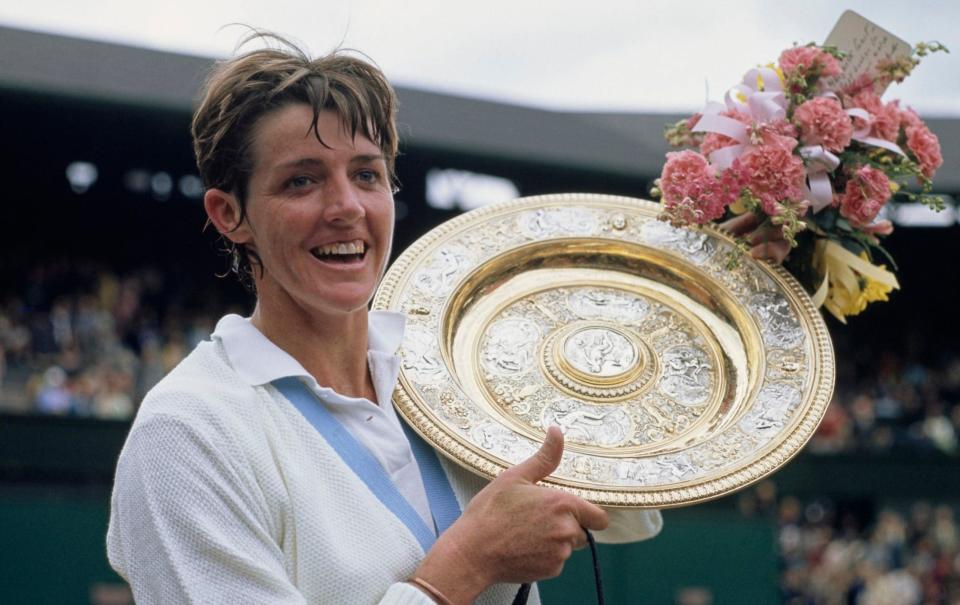 Margaret Court of Australia holds the Venus Rosewater Dish after defeating Billie Jean King in the Women's Singles Final match at Wimbledon on 3rd July 1970 - GETTY IMAGES