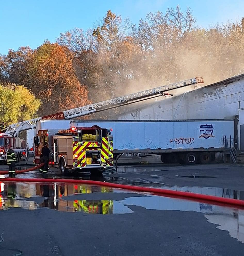 A large commercial warehouse on Route 27 in Edison was heavily damaged in a two-alarm fire that began Tuesday afternoon.