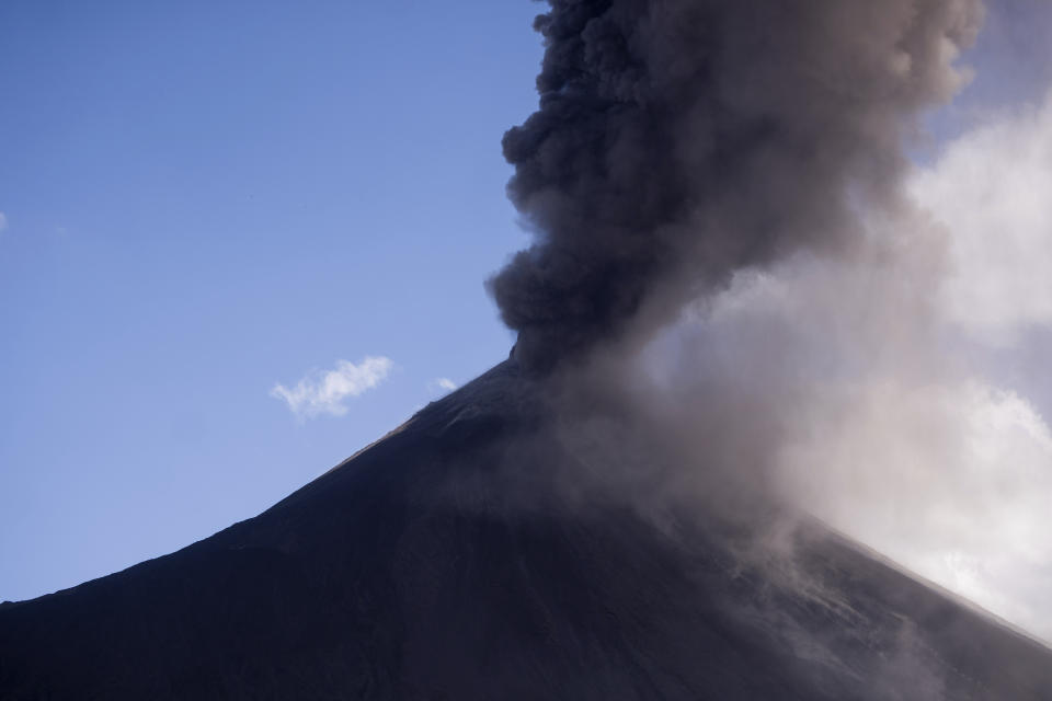 Pacaya volcano blows a cloud of ash, viewed from San Vicente Pacaya, Guatemala, Wednesday, March 3, 2021. (AP Photo/Santiago Billy )