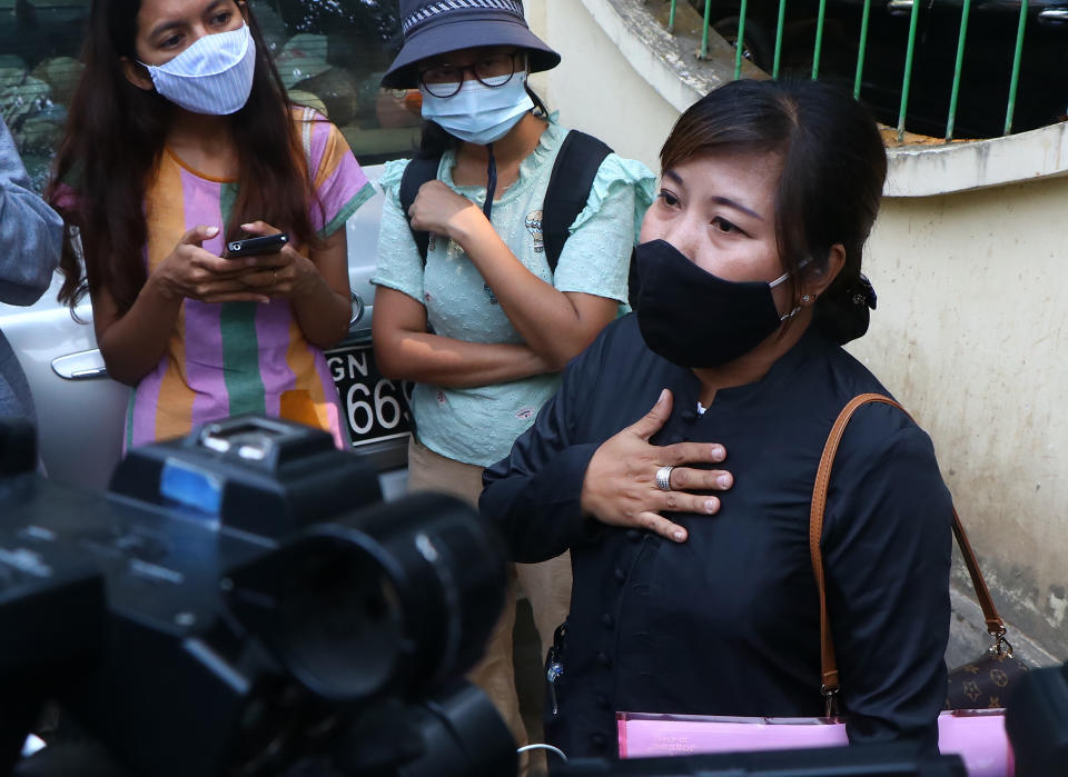 Tin Zar Oo, a lawyer representing the Associated Press journalist Thein Zaw, speaks to reporters outside the Kamayut court in Yangon, Myanmar Friday, Mar. 12, 2021. The court is scheduled to hold a hearing on Friday for Thein Zaw who was detained while covering demonstrations against the military's seizure of power last month. He is facing a charge that could send him to prison for three years. (AP Photo)