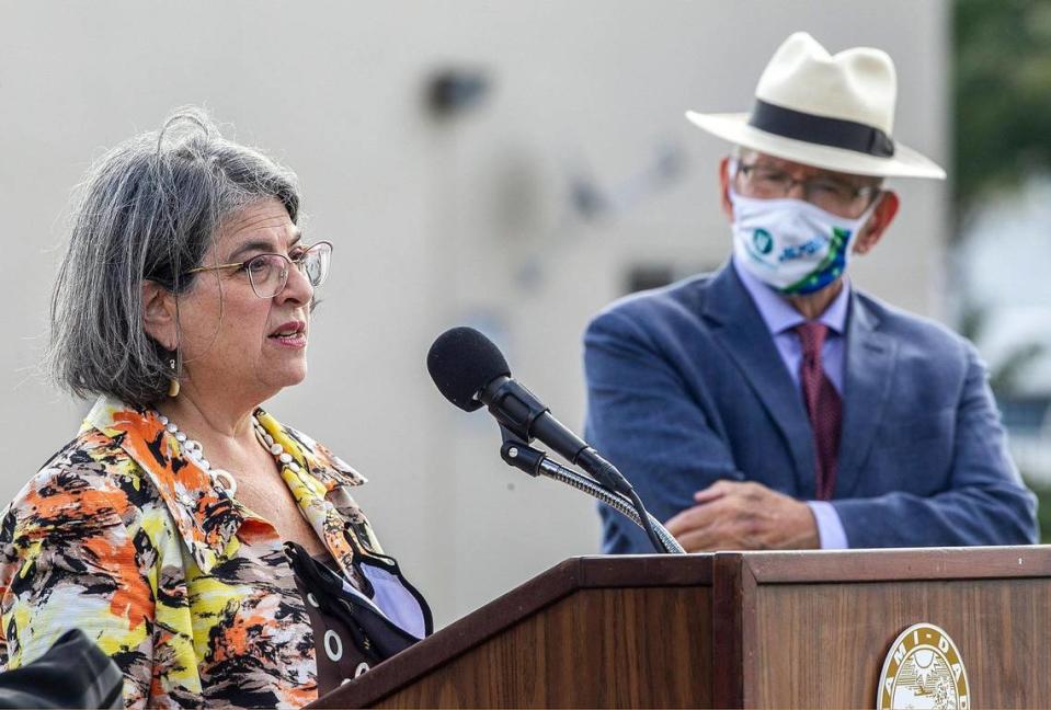 Jim Murley, Miami-Dade County’s chief resilience officer, sports his signature Panama hat while Miami-Dade County Mayor Daniella Levine Cava speaks at a press conference.