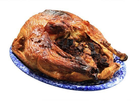 <strong>Solution:</strong> Aluminum foil is your friend. If you notice that the turkey is browning too quickly, tent it with aluminum foil to redirect the heat away from the skin. You might have to pick off some extra-black skin, but at least you've prevented a disaster. <br /><br /> Some cooks like to prevent this altogether by roasting the bird tented with aluminum foil during the first half of cooking time. Another method is to roast the bird upside down (with the breast down) for the first half of cooking time and then flip it over onto its back to finish roasting, but don't make yourself crazy attempting that with a giant bird.