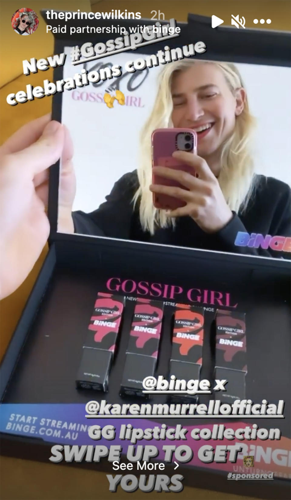 Christian Wilkins opening his The Gossip Girl Edition x BINGE Lipstick Range gift box