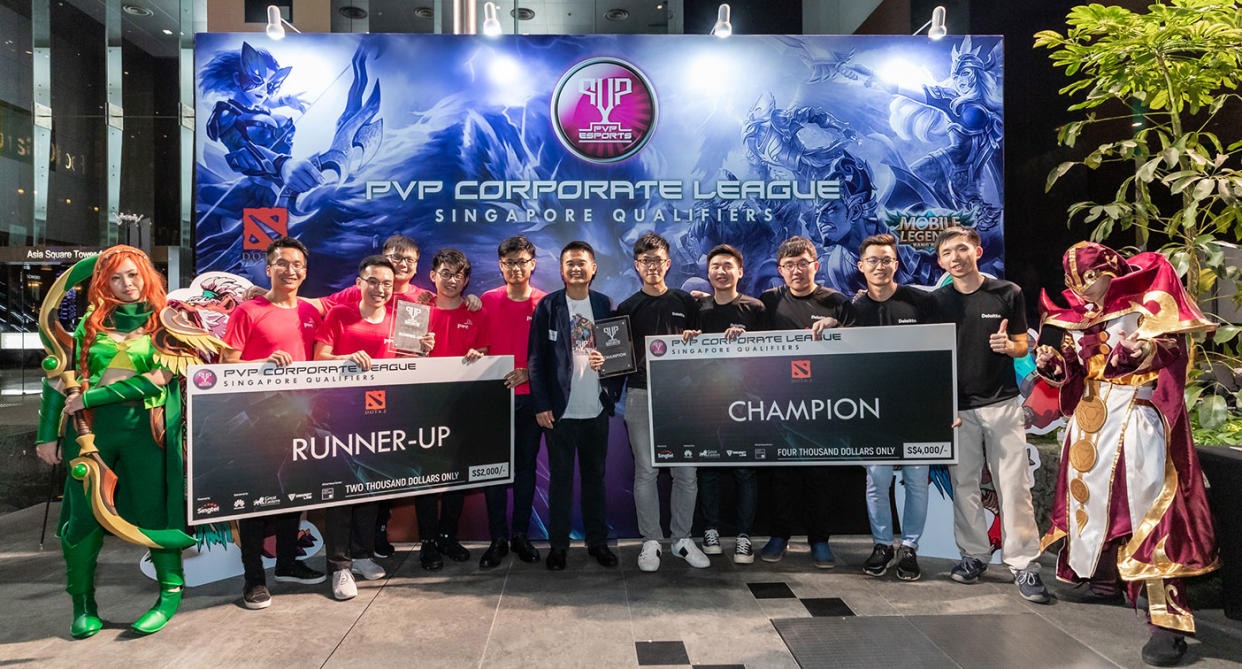 Dota 2 champion DeloitteOne and runner-up PwCSG of the Singapore leg of the PVP Corporate League. (Photo: Singtel)