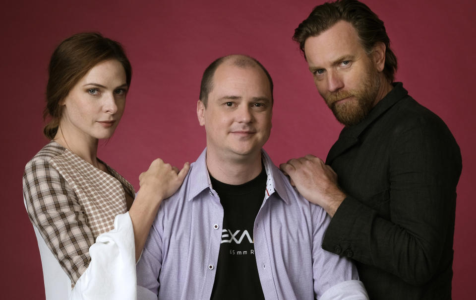 This Oct. 28, 2019 photo shows writer-director Mike Flanagan, center, and actors Rebecca Ferguson, left, and Ewan McGregor posing for a portrait to promote the film, "Doctor Sleep," at The London West Hollywood hotel in West Hollywood, Calif. (Photo by Chris Pizzello/Invision/AP)