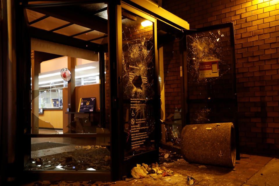 A vandalized Bank of America office is seen after a student protest turned violent.&nbsp;