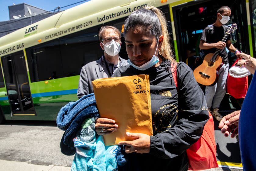 LOS ANGELES, CA - JULY 13: The group of migrants from Brownsville, Texas, arrive St. Anthony's Croatian Catholic Church on Thursday, July 13, 2023 in Los Angeles, CA. (Irfan Khan / Los Angeles Times)