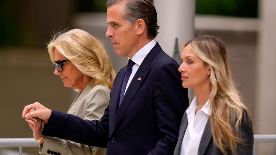 Hunter Biden, accompanied by first lady Jill Biden, left, and his wife, Melissa Cohen Biden, right, walks out of federal court after hearing the verdict, Tuesday, June 11, in Wilmington, Delaware. - Matt Rourke/AP