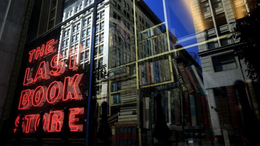 LOS ANGELES ,CA., MARCH 30 2019: The neon sign in the window of the Last Bookstore reflects the past