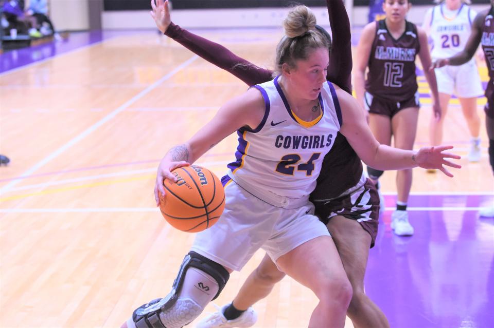 Hardin-Simmons' Kiki Gonzales (24) battles in the post during Saturday's ASC game against McMurry.