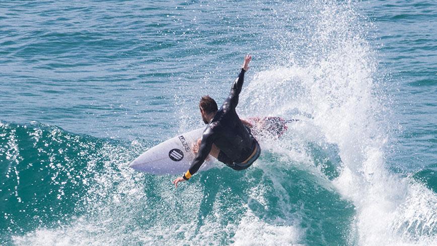 These Hot Photos Of Chris Hemsworth Surfing Will Make Your Friday