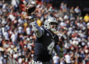 Dallas Cowboys quarterback Dak Prescott (4) passes the ball during the first half of an NFL football game against Washington Redskins, Sunday, Sept. 15, 2019, in Landover, Md. (AP Photo/Evan Vucci)