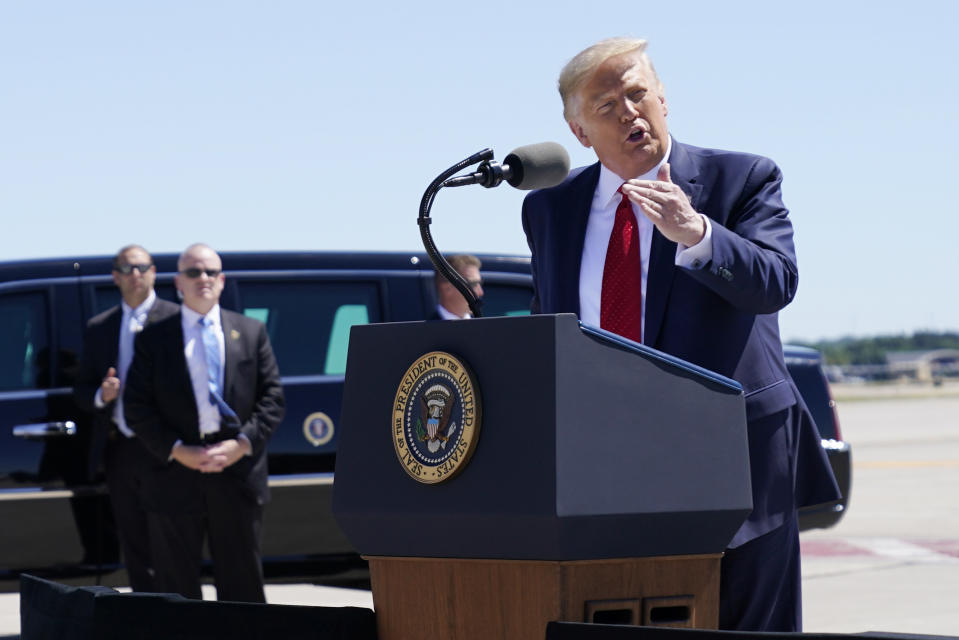 President Donald Trump speaks to a crowd of supporters at Minneapolis-Saint Paul International Airport, Monday, Aug. 17, 2020, in Minneapolis. (AP Photo/Evan Vucci)