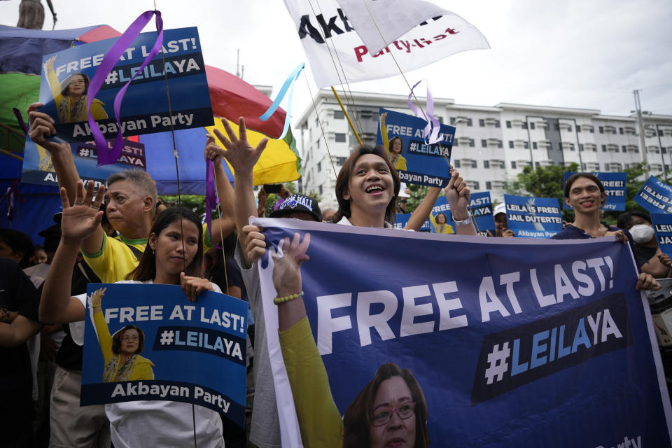 Supporters of jailed former Senator Leila de Lima reacts as they gather outside the Muntinlupa City trial court on Monday, Nov. 13, 2023 in Muntinlupa, Philippines. A Philippine court on Monday ordered the release on bail of the former senator jailed more than six years ago on drug charges she said were fabricated to muzzle her investigation of then-President Rodrigo Duterte’s brutal crackdown on illegal drugs. Two other non-bailable drug cases against de Lima have been dismissed. (AP Photo/Aaron Favila)