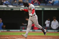 Boston Red Sox's Connor Wong steps on home plate after hitting a solo home run off Cleveland Guardians starting pitcher Carlos Carrasco during the second inning of a baseball game, Wednesday, April 24, 2024, in Cleveland. (AP Photo/David Dermer)