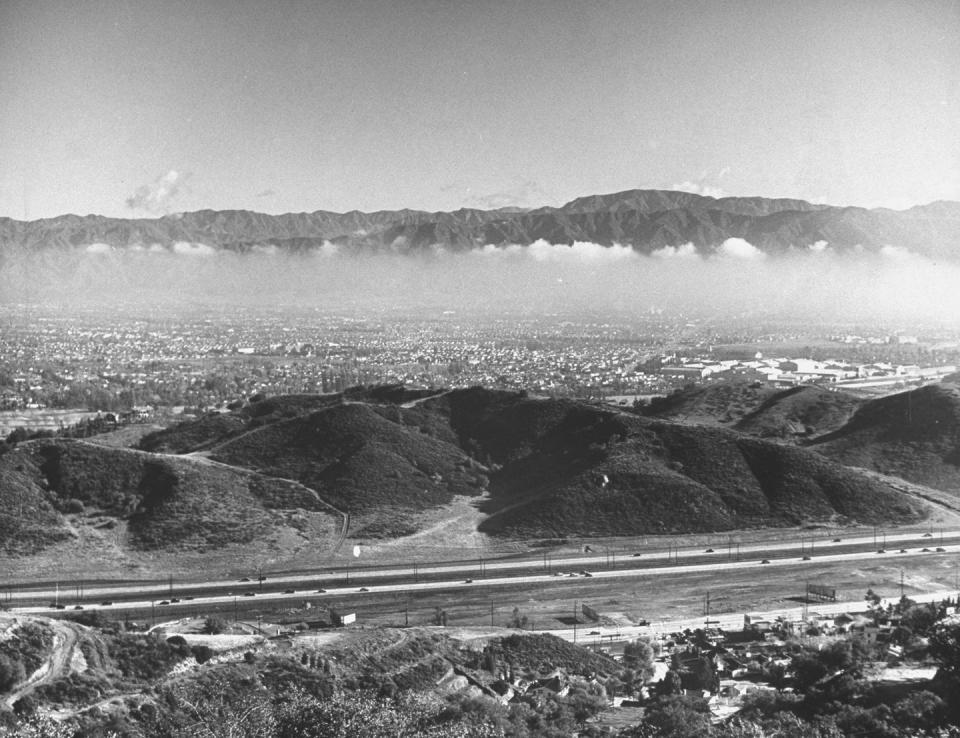 <p>This aerial view of Cahuenga Parkway in the Hollywood Hills is hardly visible, thanks to Los Angeles's serious smog problem (There's more where that came from in the following slides). </p>
