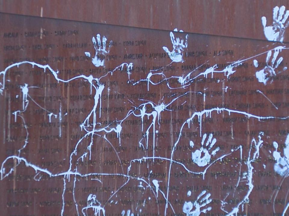 White paint on a section of the Komagata Maru memorial in Vancouver's Coal Harbour neighbourhood, pictured on Aug. 22, 2021. (Martin Diotte/CBC News - image credit)