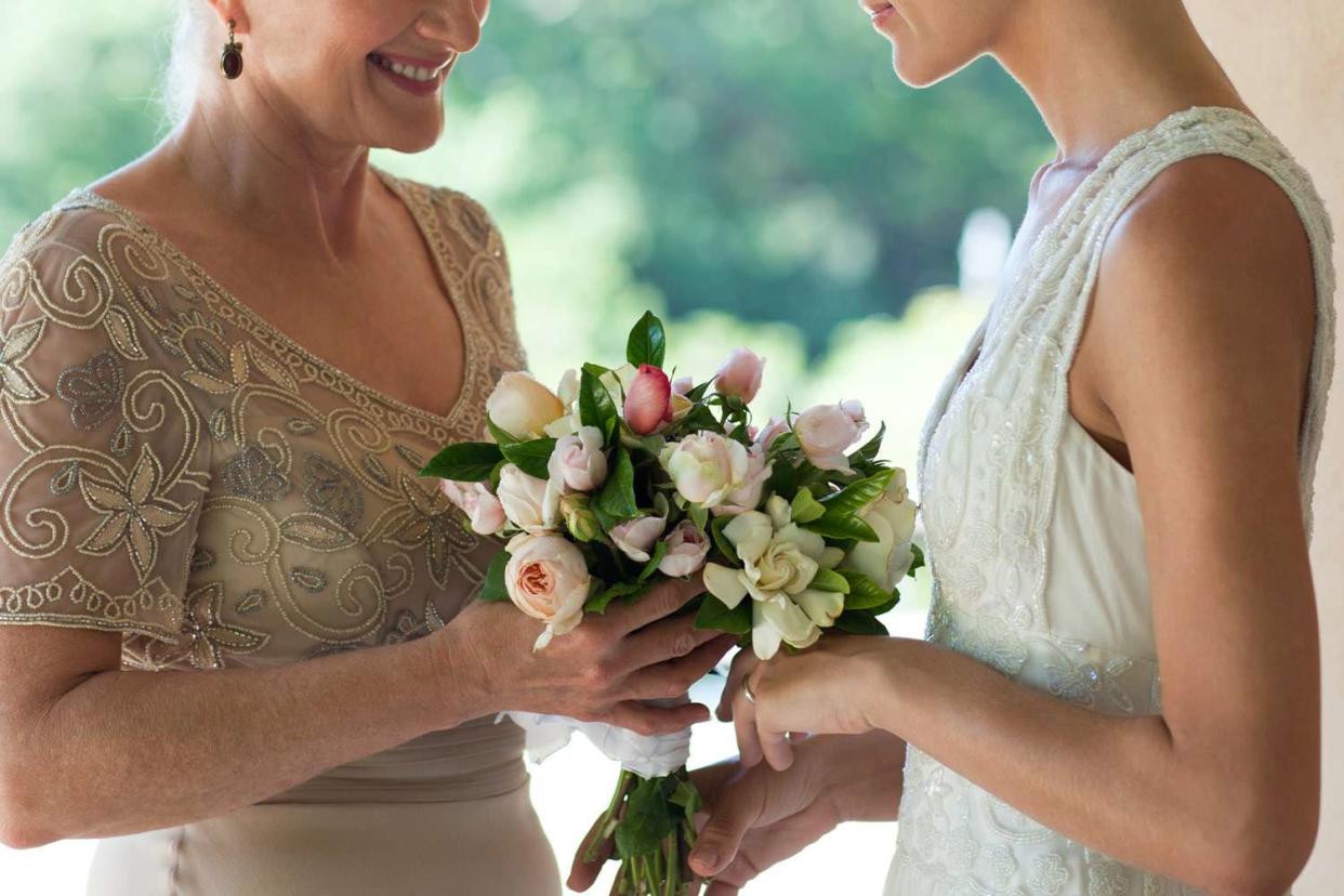 <p>Getty</p> A stock image of a bride and her mother