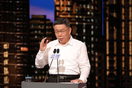 Ko Wen-je, Taipei mayor who is seeking for a re-election, speaks during televised policy debate in Taipei