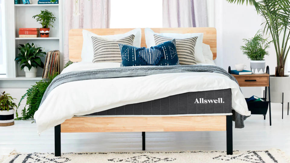 Allswell Mattress, on a wooden bedframe in a bedroom