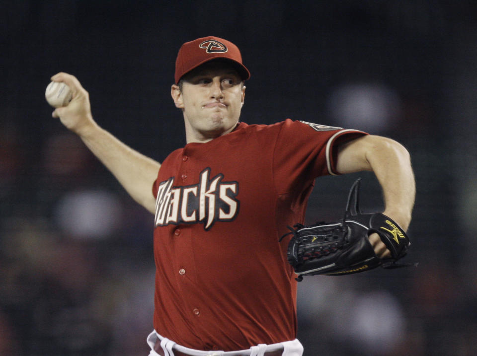 FILE - Arizona Diamondbacks' Max Scherzer throws to a New York Mets batter during the first inning of a baseball game Aug. 11, 2009, in Phoenix. Scherzer is best known for his work in Washington and Detroit, but he was drafted by Arizona and began his career there before going to the Tigers in a huge trade that also sent Curtis Granderson to the Yankees. Now a three-time Cy Young Award winner, he was dealt from the Mets to the Rangers this July. (AP Photo/Ross D. Franklin, File)