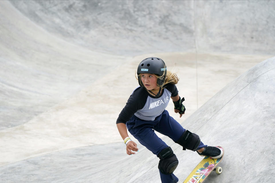 Sky Brown during park skateboard practice at an Olympic qualifying skateboarding event at Lauridsen Skatepark in Des Moines, Iowa. - Credit: Charlie Neibergall/AP