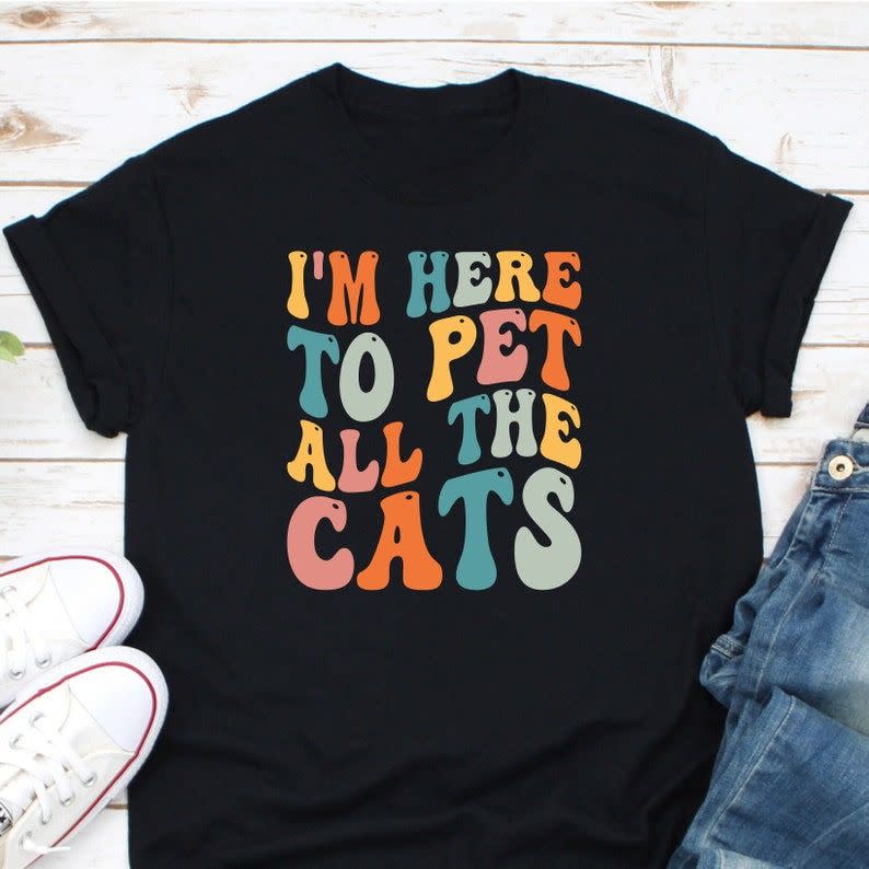 <p><strong>Todayshirty</strong></p><p>etsy.com</p><p><strong>$11.18</strong></p><p>You know that friend who makes a beeline for your cat whenever they visit and are always first in line to volunteer for cat-sitting…</p>