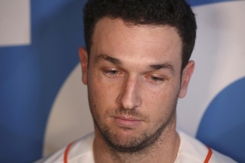 FILE - In this Jan. 18, 2020, file photo, Houston Astors third baseman Alex Bregman is interviewed by the media during the baseball team's FanFest at Minute Maid Park in Houston. The last time The Nationals and Astros played, the Nationals were celebrating their World Series title in Houston. Since then the Astros have become the league's villains, with a sign-stealing scandal tarnishing their reputation and casting a shadow on their 2017 title. (Steve Gonzales/Houston Chronicle via AP, File)